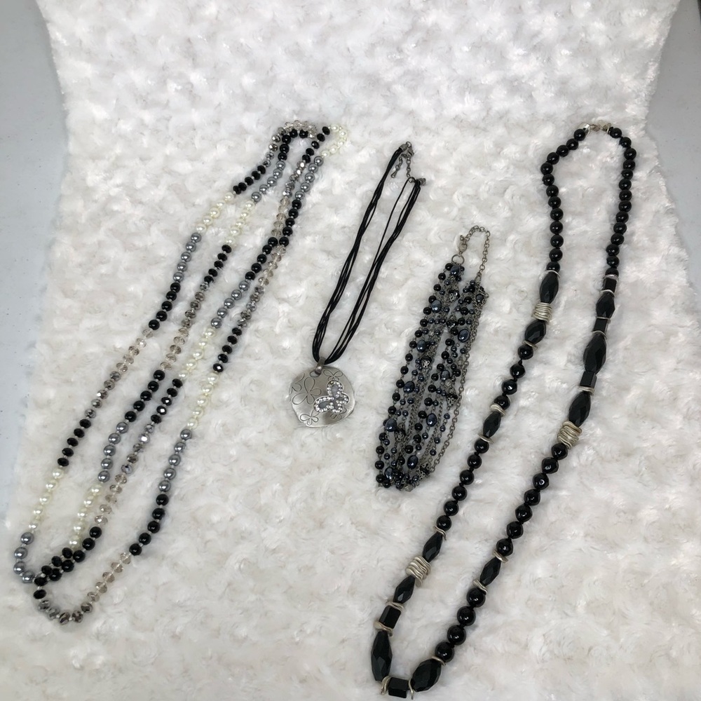 Necklaces- Black/White/Silver and some bling!
4 necklaces